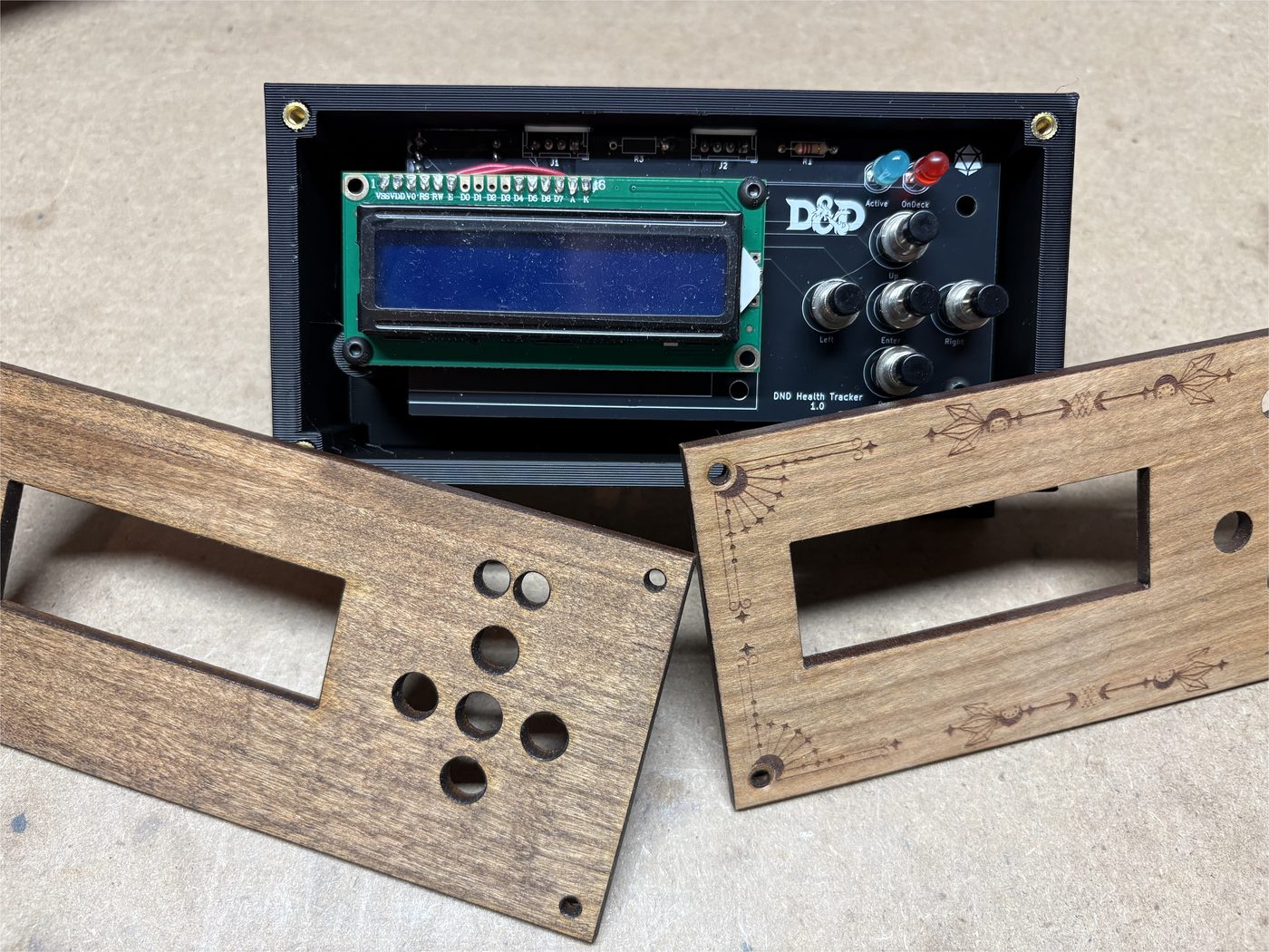 Finished stat tracker modules in wooden and 3D-printed housings